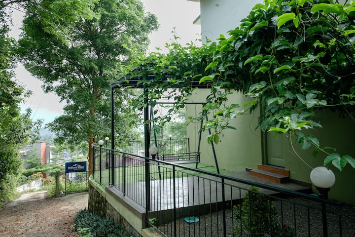 Covered Entrance Area with Swing and Resort Sign